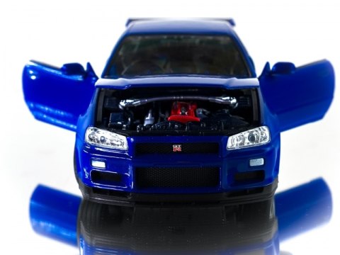 WELLY NISSAN SKYLINE GT R 1:24 SAMOCHÓD KOLEKCJONERSKI WELLY NISSAN SKYLINE GT R 1:24 SAMOCHÓD KOLEKCJONERSKI
